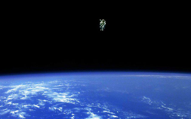 Mission Specialist Bruce McCandless free flying in an MMU (Manned Maneuvering Unit) 